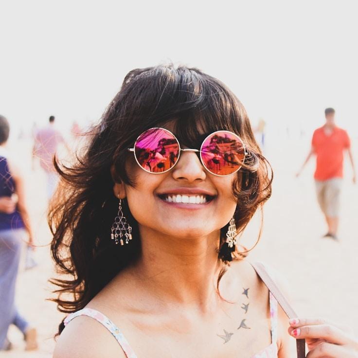 Asha Rao, Lead Design Curator at Canyon Ridge Crest, reviewing corporate floral arrangements